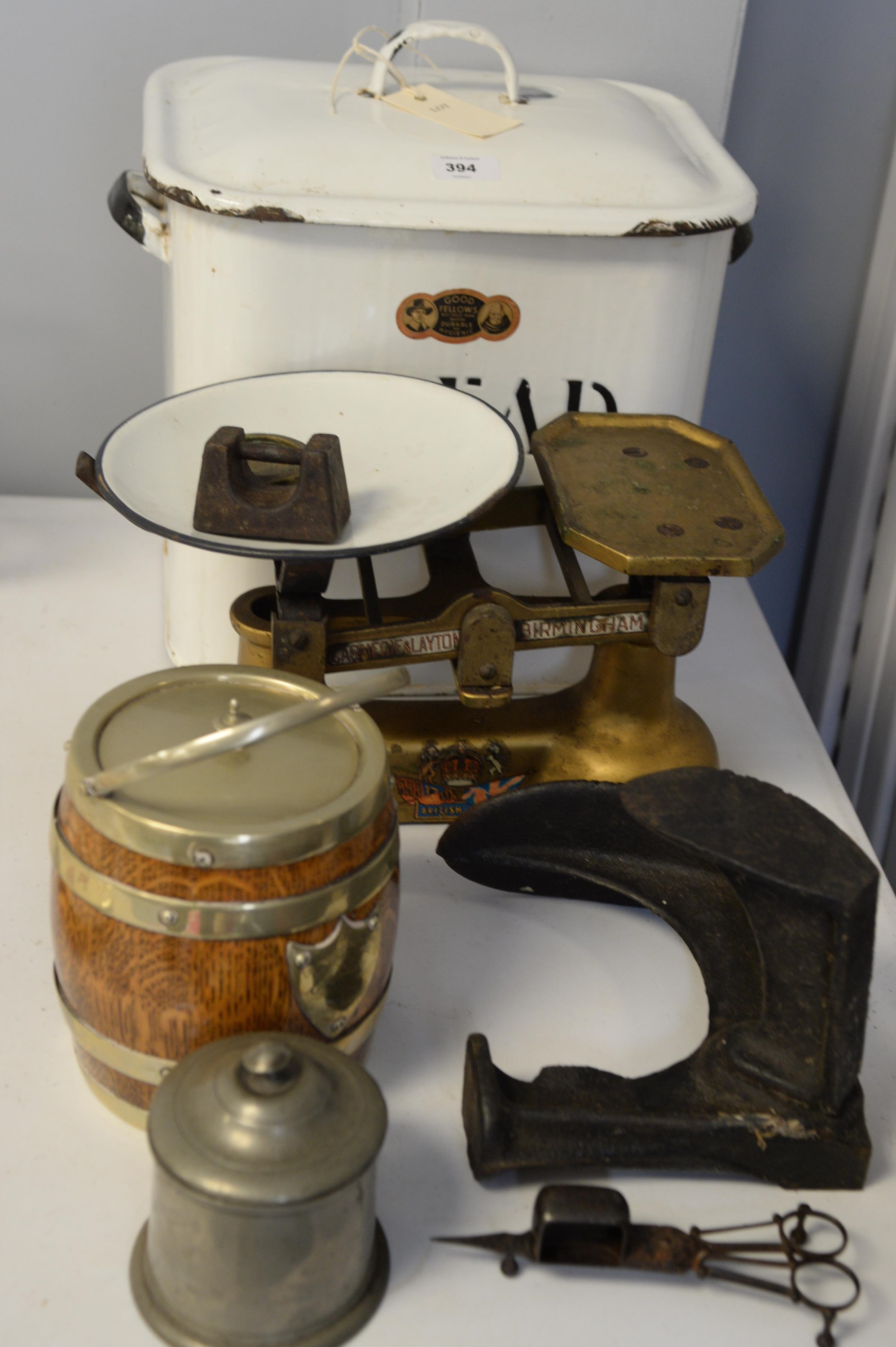 Enamel bread bin, scales, and other items.