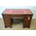 Reproduction mahogany pedestal desk.