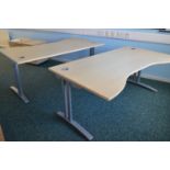 Office Dispersal Auction: Four maple effect desks.