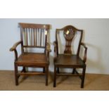 Two Georgian solid seat dining chairs.
