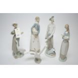 Five Lladro figurines.