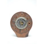 An aneroid barometer set into the wooden propeller boss from an F.E.2b WWI aeroplane.