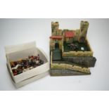 Britains hollow-cast toy soldiers; and a wooden fort.