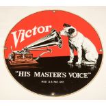 A Victor "His Masters Voice" circular enamel advertising sign.