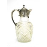 Silver mounted cut glass claret jug