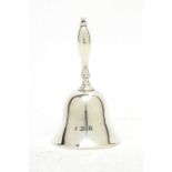An Edwardian silver table bell.