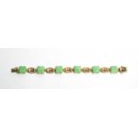 Carved jade and 9ct yellow gold bracelet