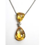 A citrine and diamond drop pendant