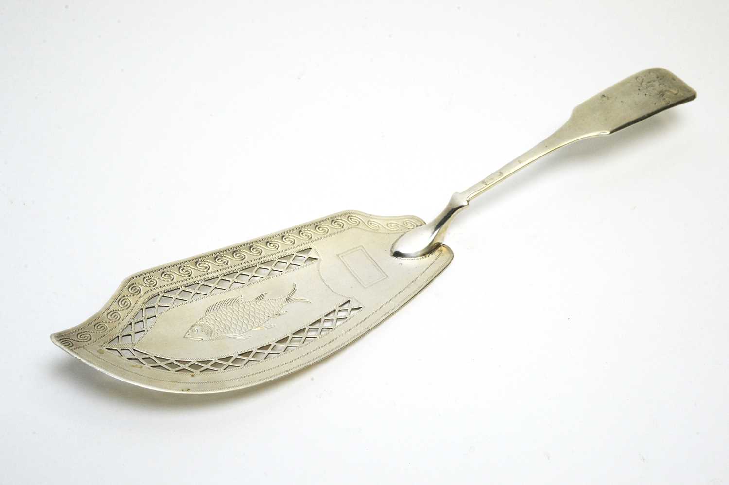 A George III silver fish slice.