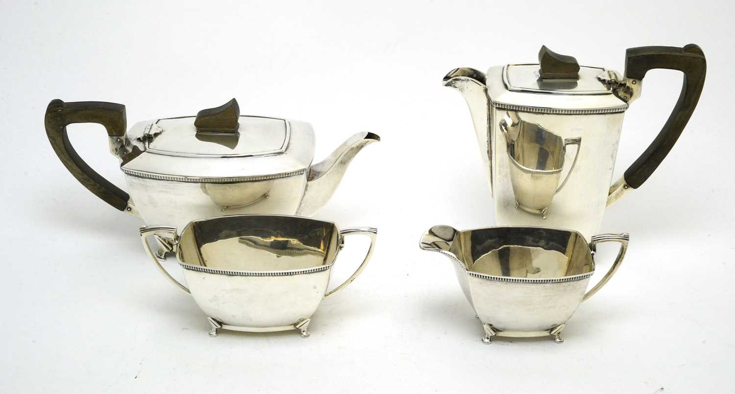 An Elizabeth II Art Deco style four-piece tea service.
