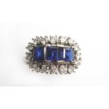 A sapphire and diamond cluster ring