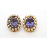 A pair of synthetic colour change sapphire and pearl cluster earrings.