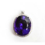 An amethyst and diamond cluster pendant