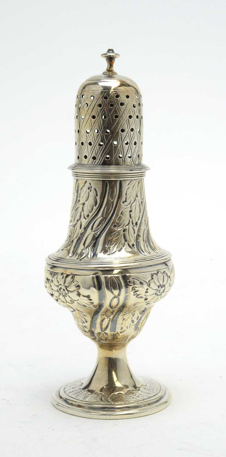 A George III silver pepperette.