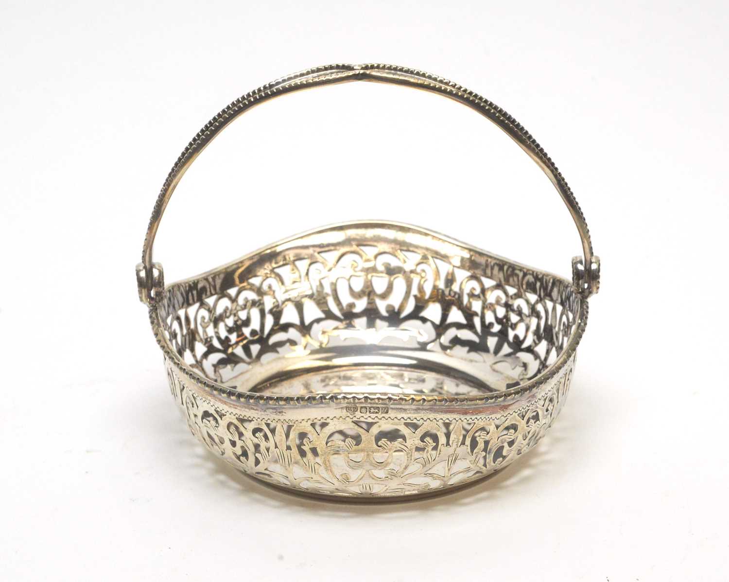 A Queen Elizabeth II silver basket.