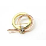 Mid 20th C yellow and rose coloured metal and diamond brooch.