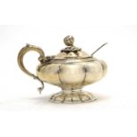 An early Victorian silver mustard pot.