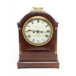 A Regency mahogany mantel clock.