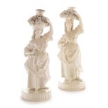 Pair of King Street Derby candlestick figures in the white
