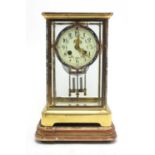 Early 20th C lacquered brass-cased French mantel clock.