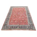 A fine signed Kashan carpet