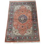 A modern silk Persian rug.
