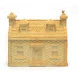 A Scottish Stoneware Cottage moneybox