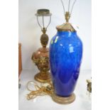 Sevres earthenware blue lamp base; and another lamp base, both with shades.