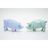 Two Herend pig ornaments.