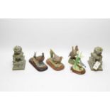 Border FA resin figures; a porcelain model; and two Chinese style Buddhist lions.