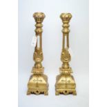 Pair of ecclesiastical style candlesticks.