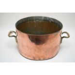 Large copper and brass cooking pot.