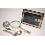 Silver-mounted photograph frame; metal box and spoon; and other items.