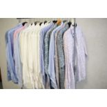 Twenty-one gent's designer shirts.