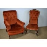 Victorian rosewood nursing chair; and a red upholstered armchair.