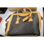 Louis Vuitton, Paris, leather overnight bag.