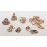 Gold cufflinks and charms