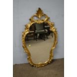 Rococo style gilt wood mirror.