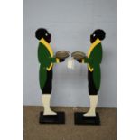Pair of 20th C painted candle stands.