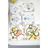 Four Dutch Delft tiles; and two modern Picasso style tiles.