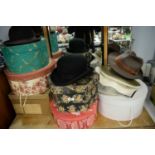 Four bowler hats and boxes; and other hats.