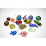 A group of Venetian glass coloured modelled fruit, including: orange, peppers, grapes, etc.