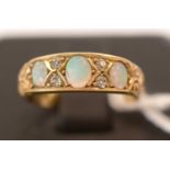 Opal and diamond ring