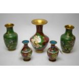 A pair of cloisonne vases; a smaller pair of vases and a single vase