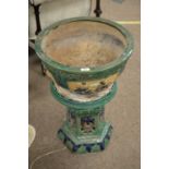 A 20th Century Chinses stoneware green glazed jardiniere and stand