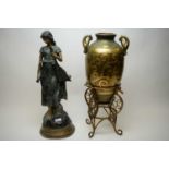 Bronzed figure of a girl; and a bronzed finish vase.