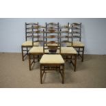 Set of six Ercol ladder back dining chairs.