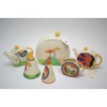 A quantity of ceramics to include teapots, water jug and biscuit jar