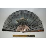 Continental black silk fan; and a letter opener.