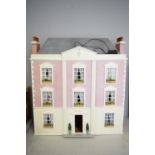 Georgian style doll's house with fully fitted interior.